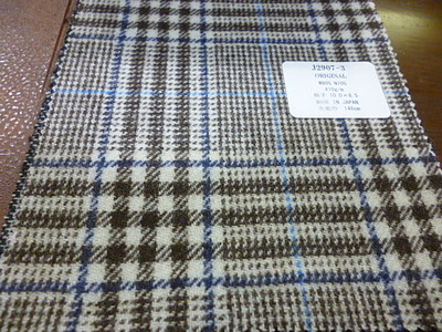 クラシカルなチェック柄のチェスターコート