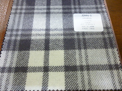 グレーの濃淡の優しい雰囲気のウール素材でオーダージャケット