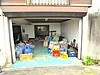 シャッターを引き込み戸に取り替える物置の出入口のリフォーム　浜松市北区