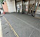 店舗の入口、古くなったタイルのままにしていませんか?|和モダンな洗い出し仕上げの施工事例